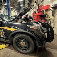 Fleet Management - WEP employee working on vehicle