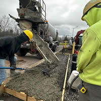 Construction Inspection - WEP employees overseeing concrete pouring