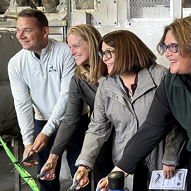 Shannon Harty, Commissioner (second from left) cutting the ribbon at WEP's new Dryer Building